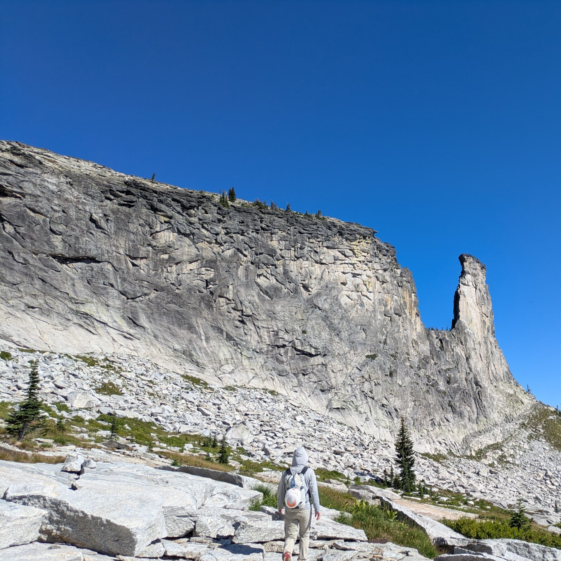 Rock Climber approaching Chimney Rock in the Selkirk Crest, Northern Idaho